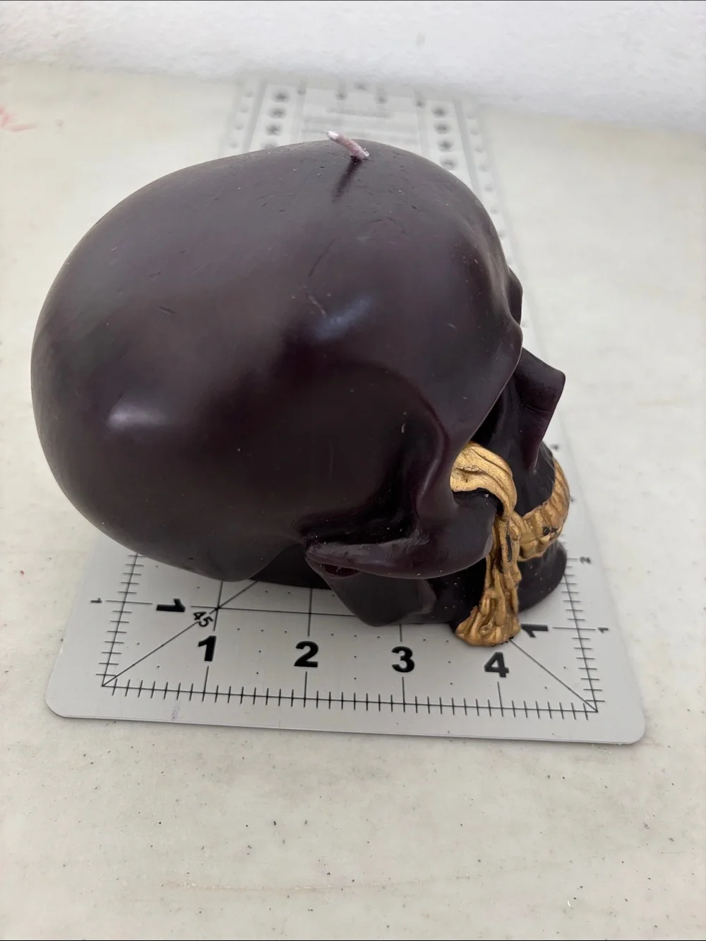 New - Dark Brown Skull Candle with Gold Drip Accent